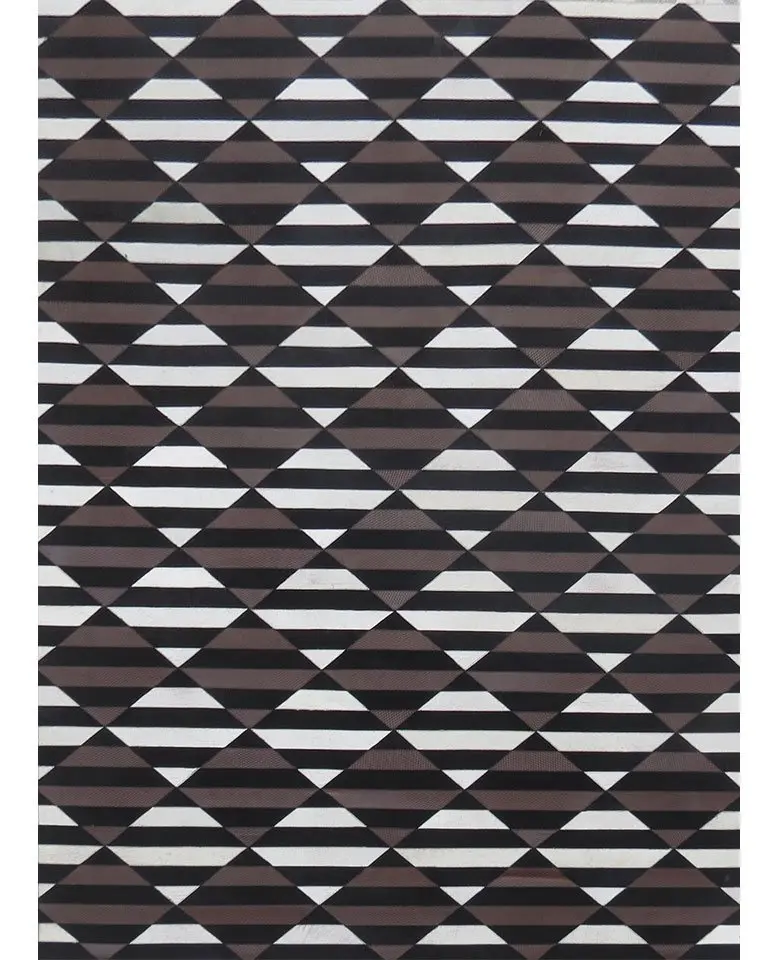 Handmade rug made up of Buffalo Leather dyed cut stitched