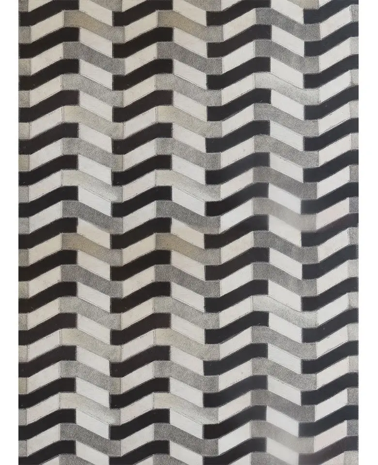 Handmade rug made up of Buffalo Leather dyed cut stitched